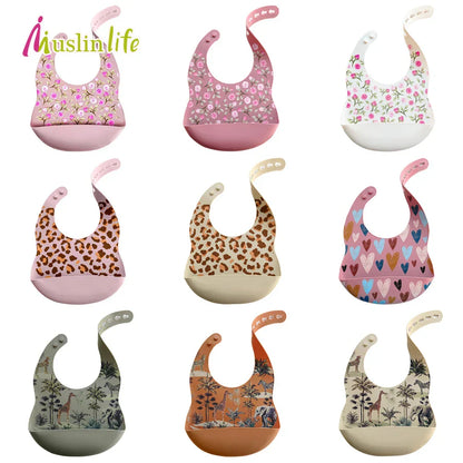 BPA-free silicone baby bib with a fun cartoon shark, essential for mess-free mealtimes