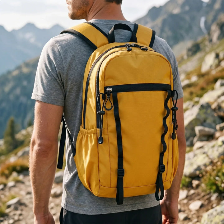 Cyan unisex foldable hiking daypack, lightweight and compact for travel.