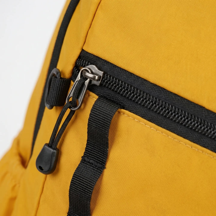 Compact foldable hiking backpack in cyan, ideal for lightweight travel and outdoor adventures.