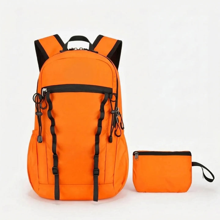 Unisex packable travel daypack in cyan. Foldable backpack for hiking, camping, and lightweight adventures.