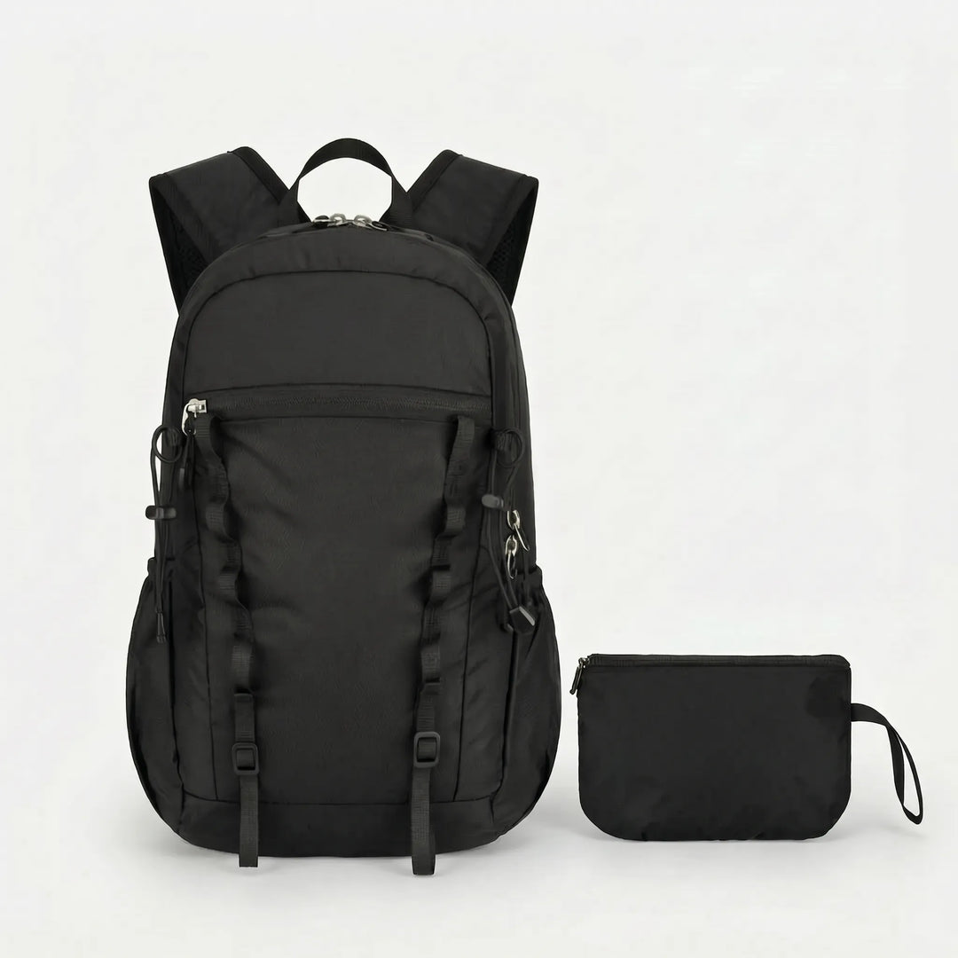 Foldable hiking & camping daypack. Lightweight cyan backpack, compact for easy storage and travel.