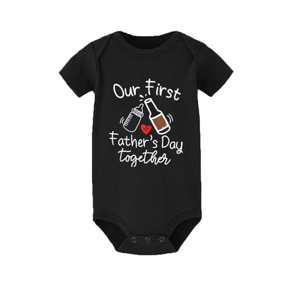 Close-up of a smiling dad in his 'First Father's Day' shirt. A great daddy and me summer outfit.
