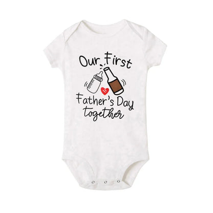 Baby's 'My First Father's Day' romper with envelope neck for easy changing. New dad gift.