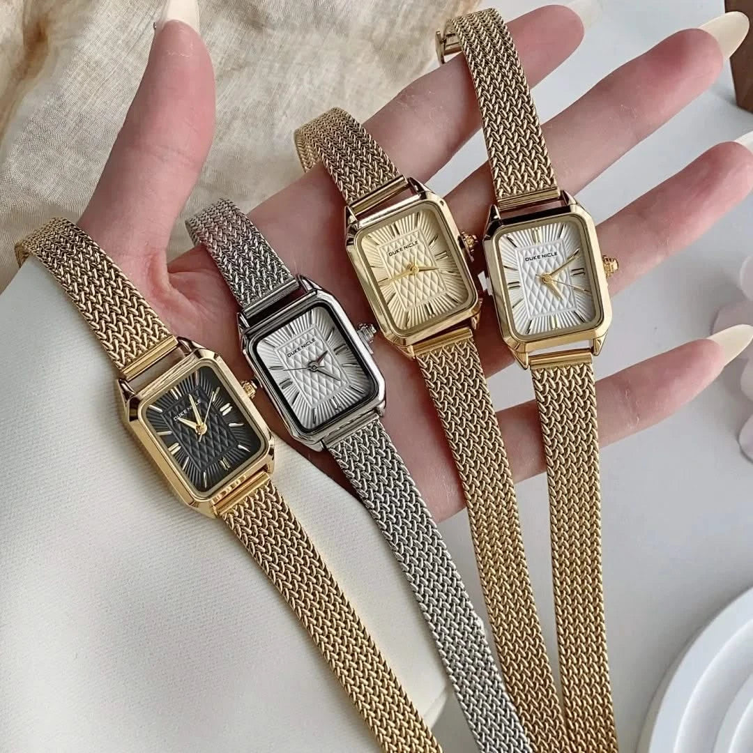 Dainty women's stainless steel wristwatch, elegant and sleek fashion accessory.
