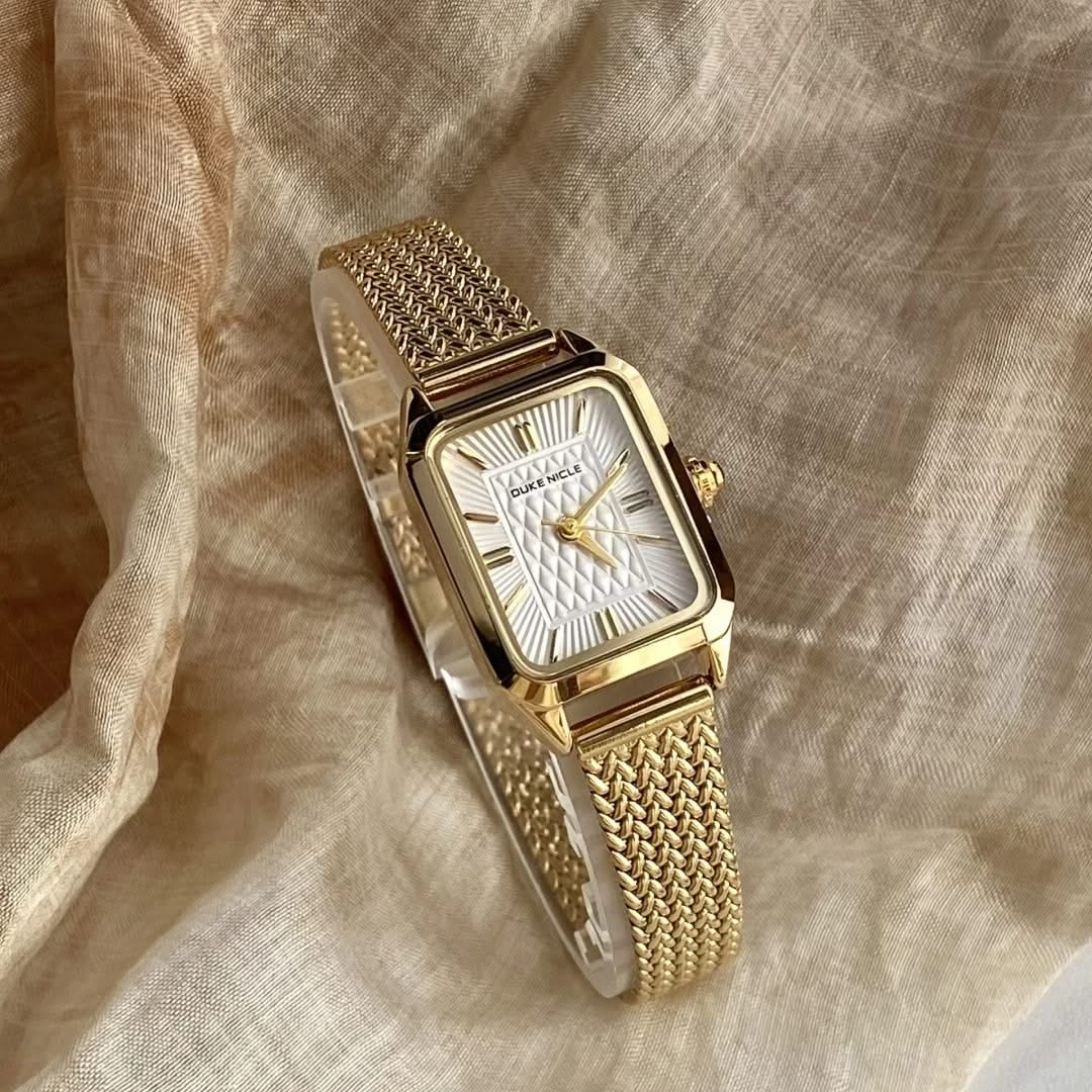Elegant gold women's stainless steel watch, a dainty and sleek fashion timepiece.