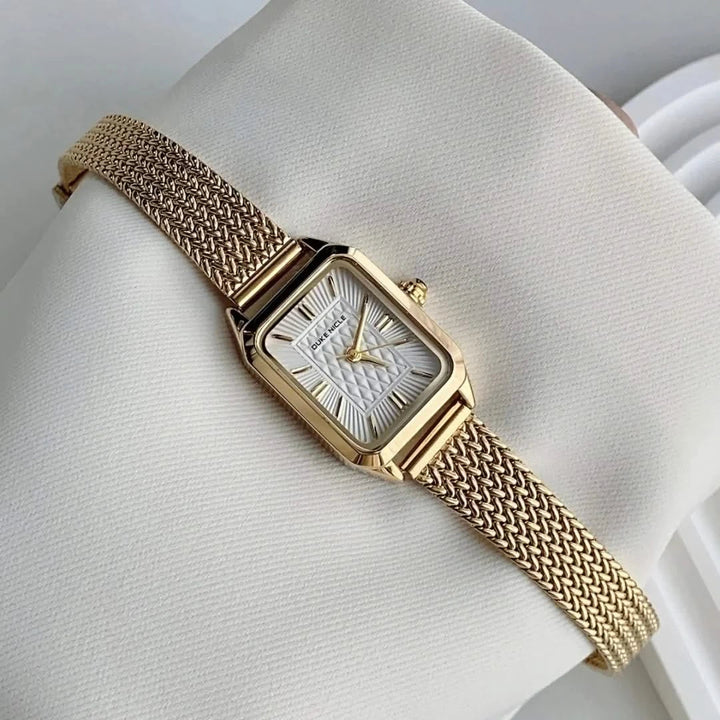 Petite silver women's stainless steel watch, adjustable and sleek fashion accessory.