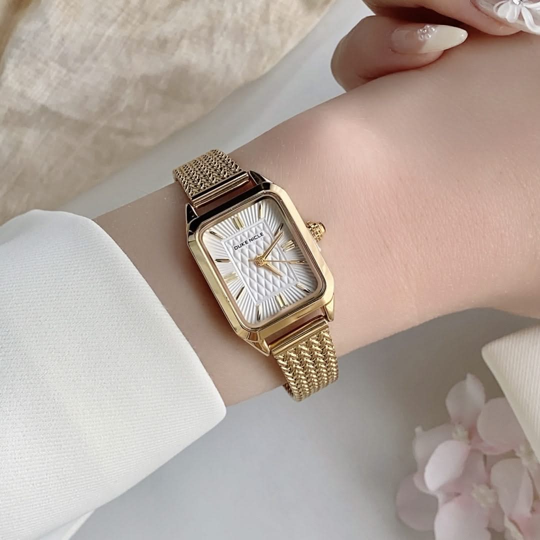 Dainty black women's stainless steel watch, an elegant and modern fashion accessory.
