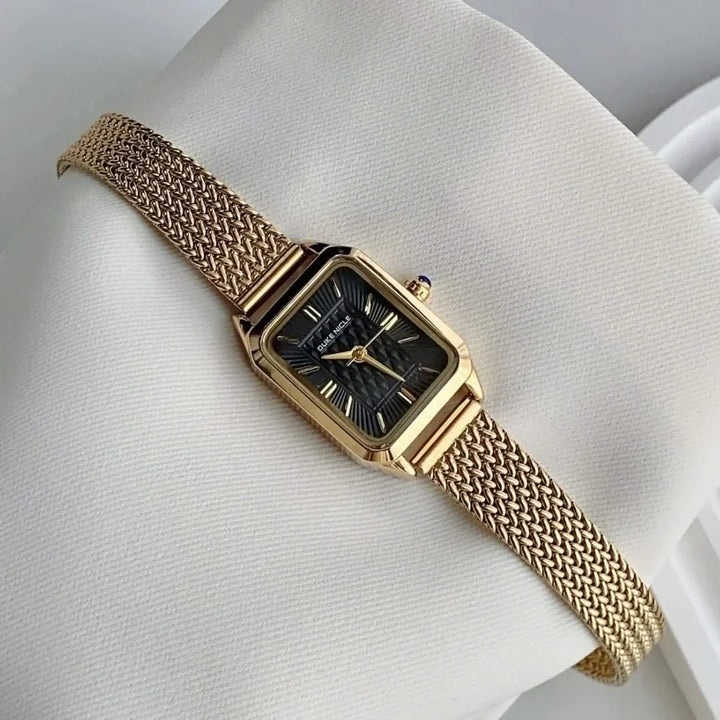 Dainty women's stainless steel watch, a petite and elegant fashion accessory.