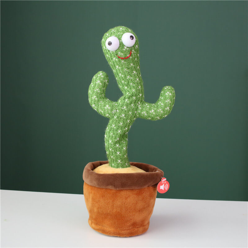 Close-up of a smiling interactive dancing cactus plush, a musical baby gift for joyous learning.