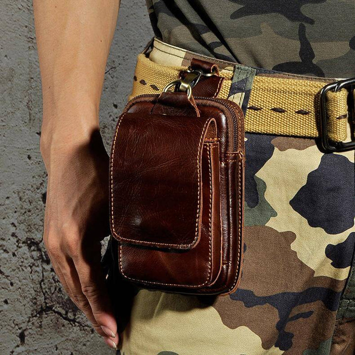 Premium dark brown men's fanny pack for organized, hands-free everyday carry.