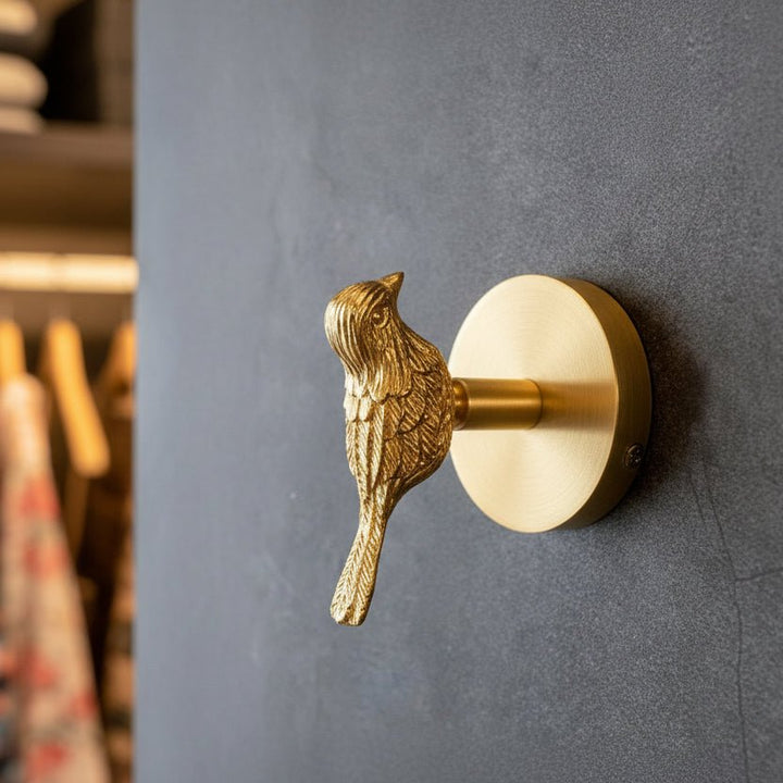 Decorative gold animal coat hook for elegant home wall decor & entryway organization.