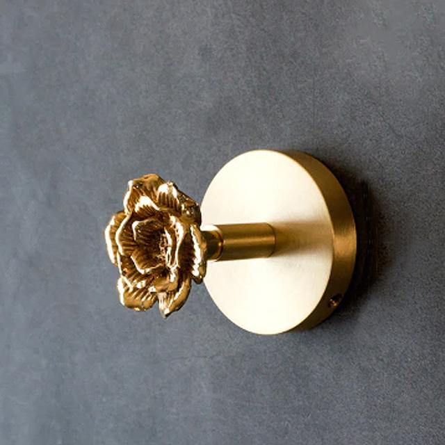 Modern gold animal coat hook, a chic decorative wall hanger for contemporary home accessories.
