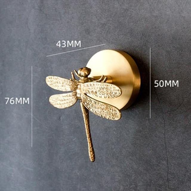 Gold decorative animal coat hook, an elegant & practical addition to any entryway decor.