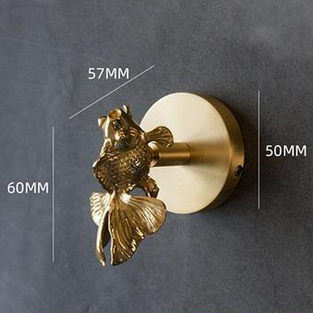 Artistic gold animal wall hook, a sophisticated piece of decorative home wall decor.