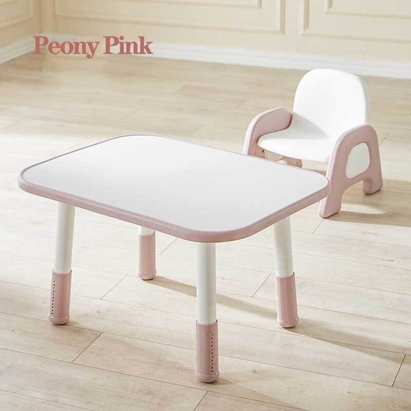 Children's playroom with a height-adjustable peony pink plastic activity table