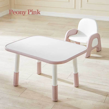 Children's playroom with a height-adjustable peony pink plastic activity table