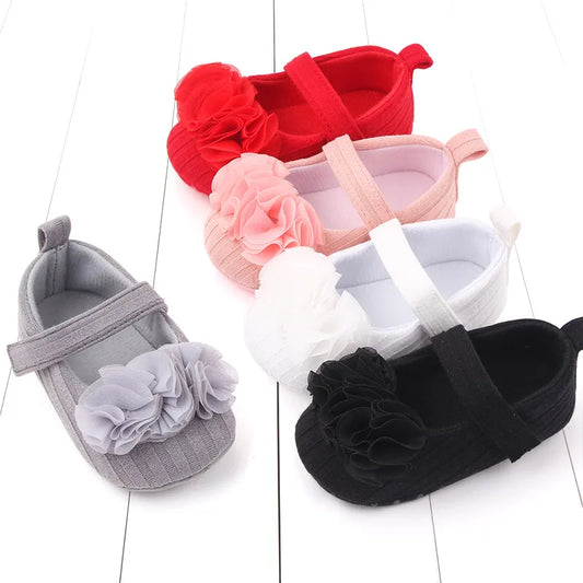 Delicate floral cotton soft sole baby shoes for girls, ideal first walker footwear.