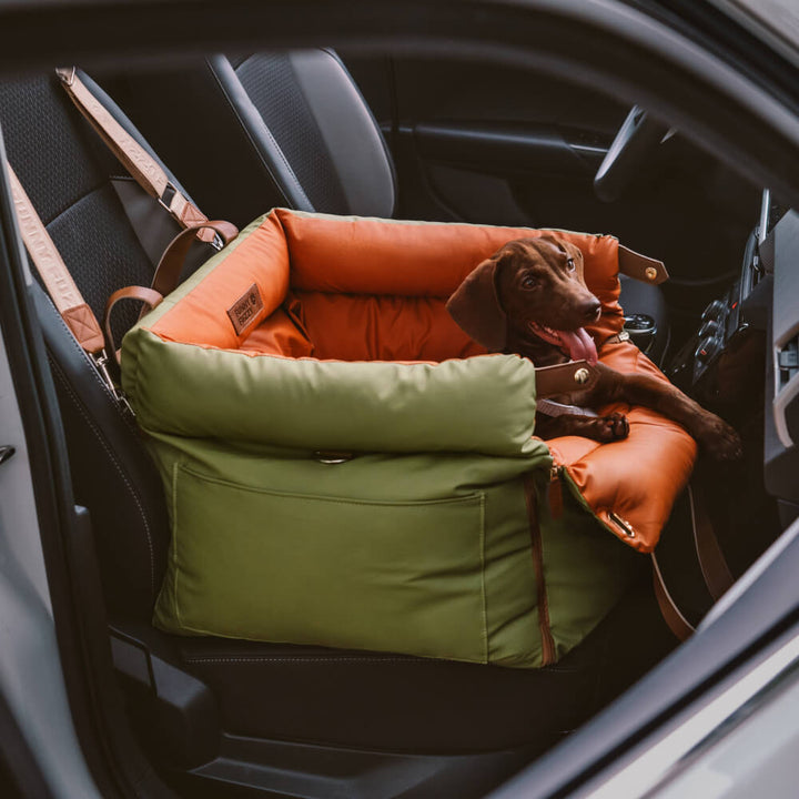 PawLuxury dog booster seat for car safety; cozy pet travel bed with secure straps.