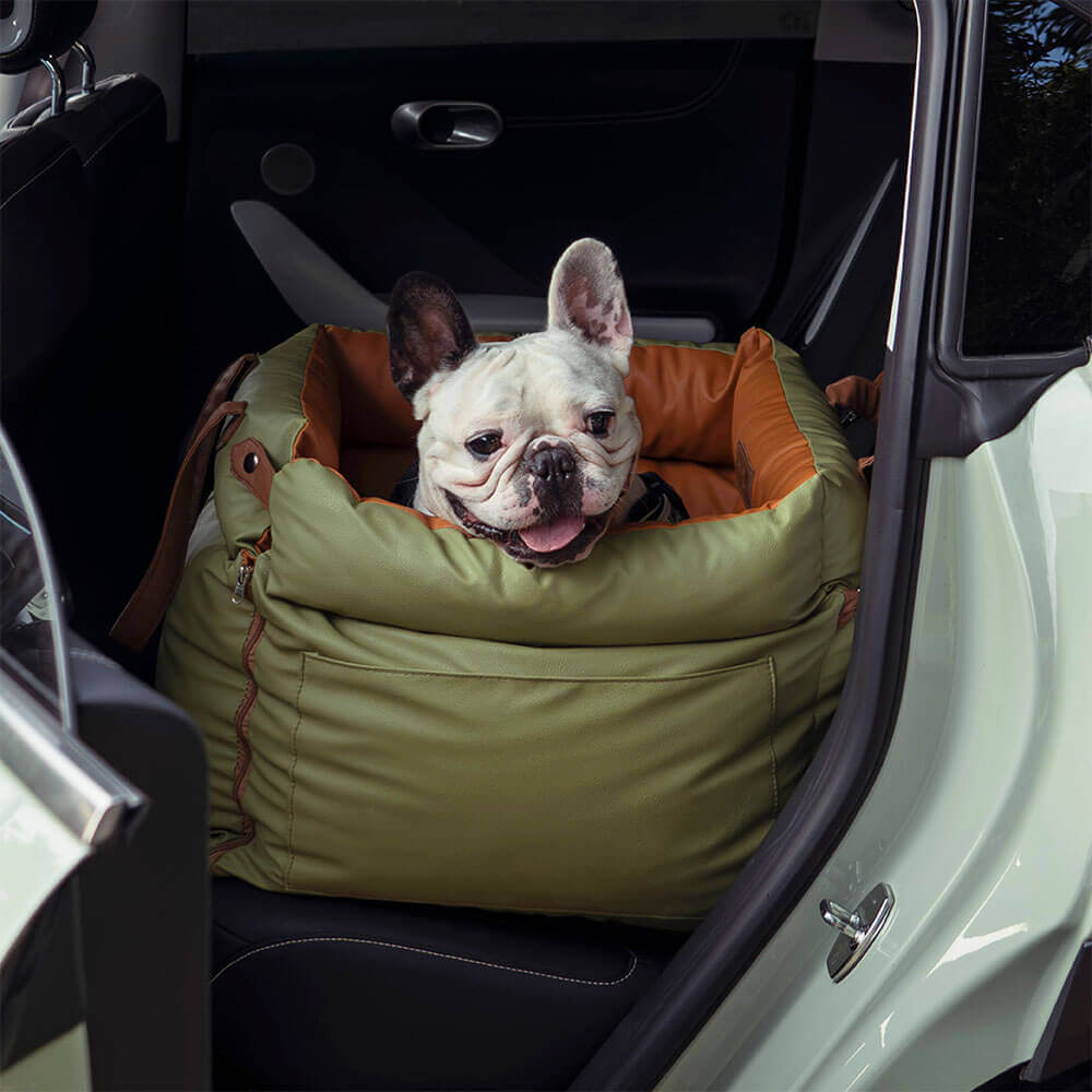 Secure dog car seat for pets; comfortable booster bed in faux leather for rides.