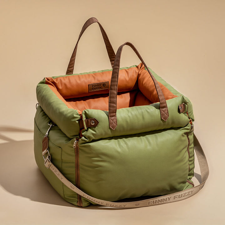 Faux leather pet booster car seat; comfortable dog travel bed with safety features.