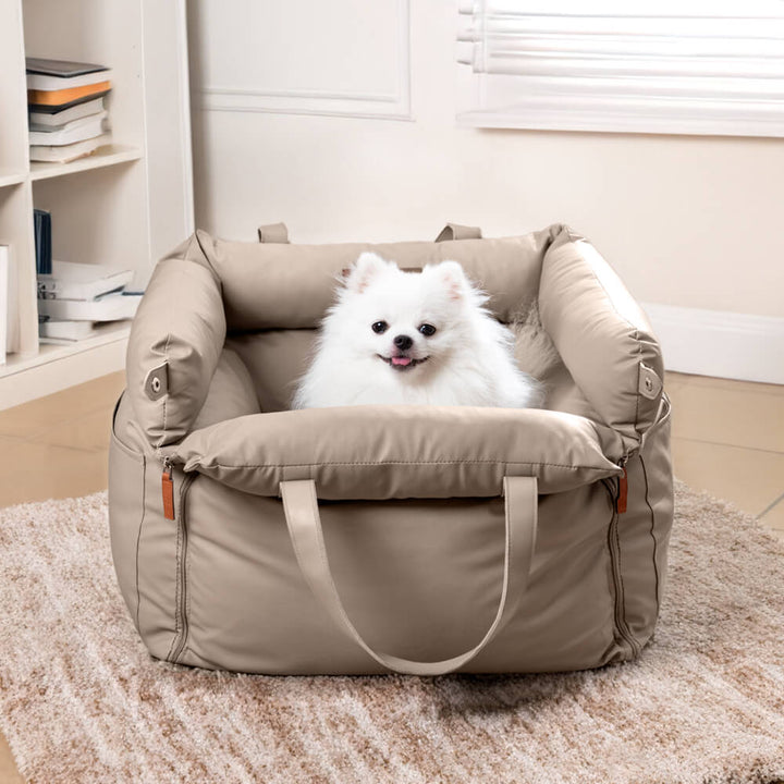 Deluxe dog car seat for comfortable rides; booster bed with safety straps.