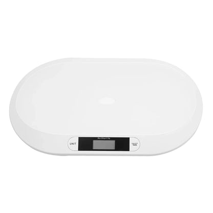 White digital baby weight scale on a clean surface, ideal for precise infant growth tracking and pet weight monitoring.