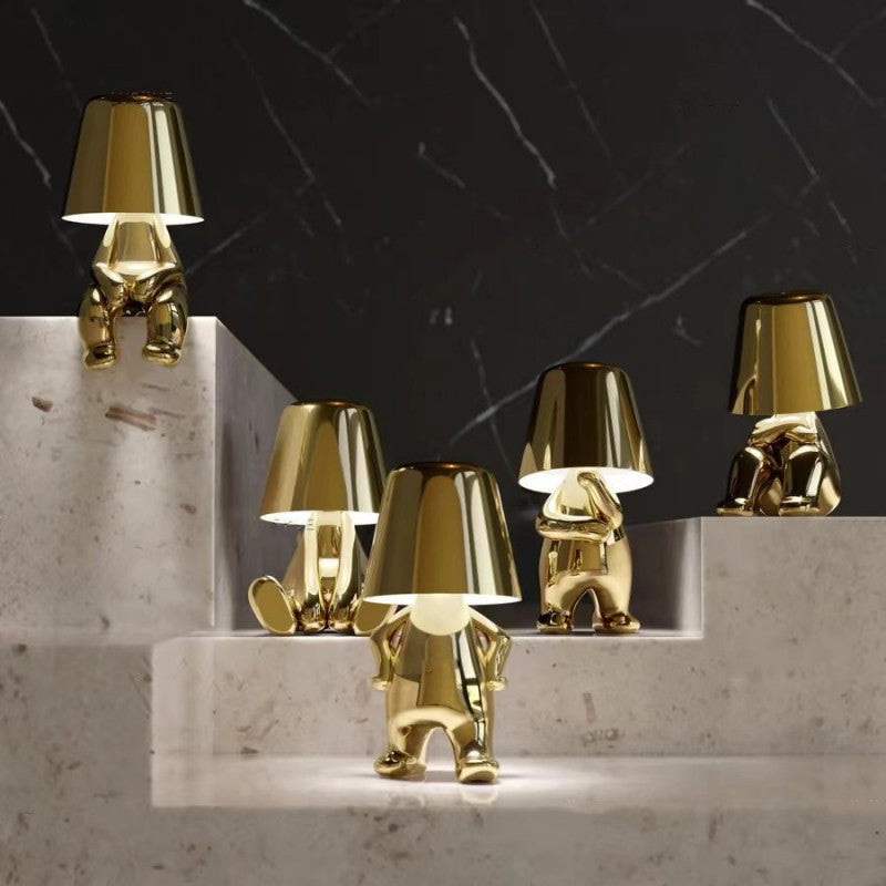 Dimmable table lamp with playful artistic resin design. Creative accent lighting for any room.