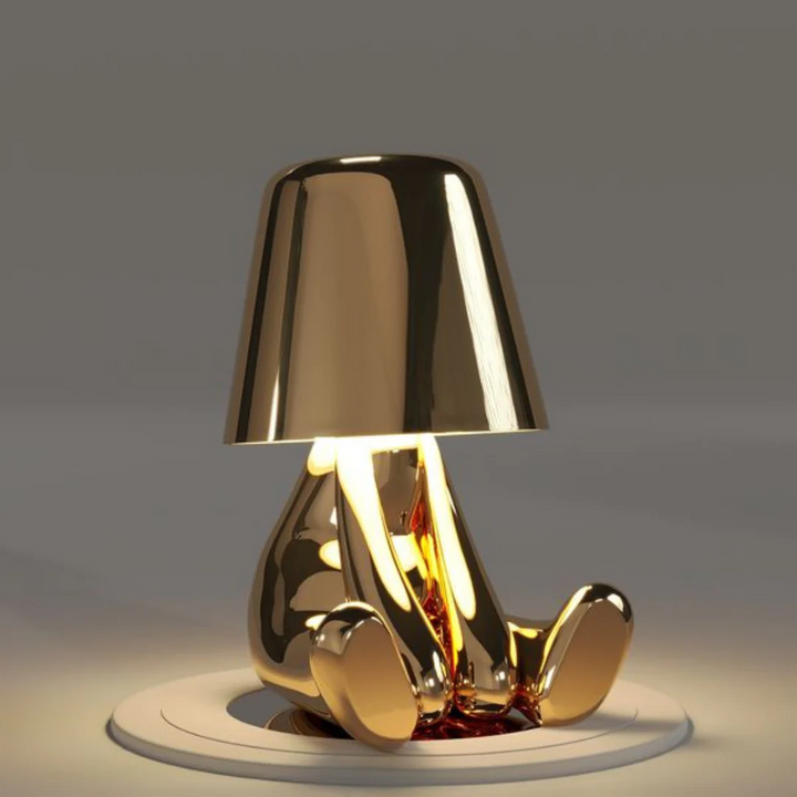 Wireless dimmable table lamp, playful artistic resin design. Portable touch lamp for creative spaces.