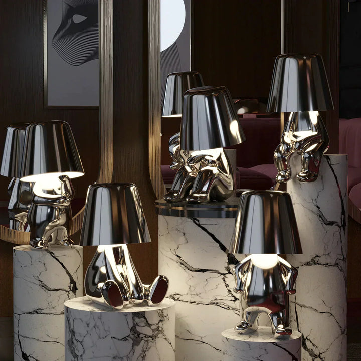 Artistic resin dimmable table lamp. Unique playful design, perfect for creative mood lighting.