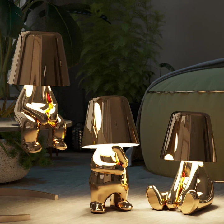 Portable dimmable touch lamp with playful artistic design. Wireless accent light for modern spaces.
