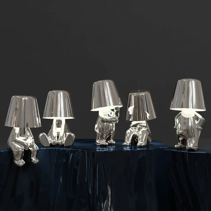 Creative dimmable table lamp. Playful resin design, offering versatile, portable accent lighting.