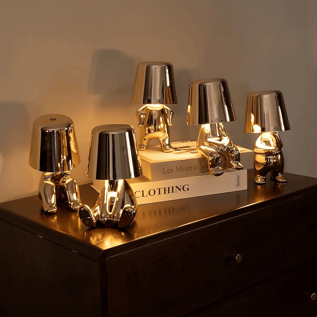 Whimsical dimmable table lamp. Artistic resin design for playful, creative, and portable mood lighting.