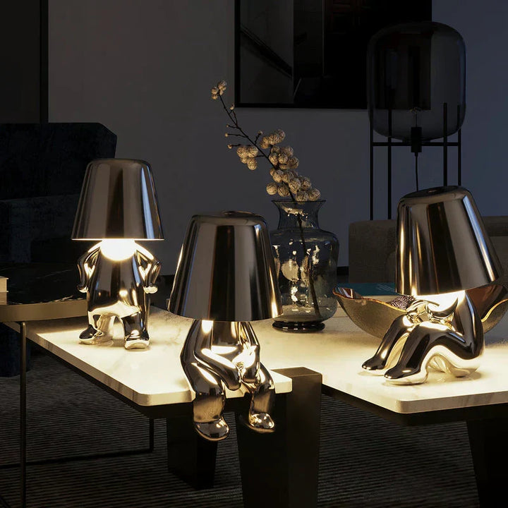 Playful artistic dimmable table lamp. Creative resin mood lighting, portable for any setting.