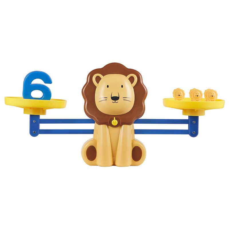 Preschool children learning weight and numbers with an animal balance scale toy