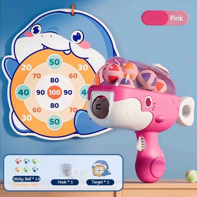 Detail of the soft, child-safe sticky balls used in the dinosaur target practice game