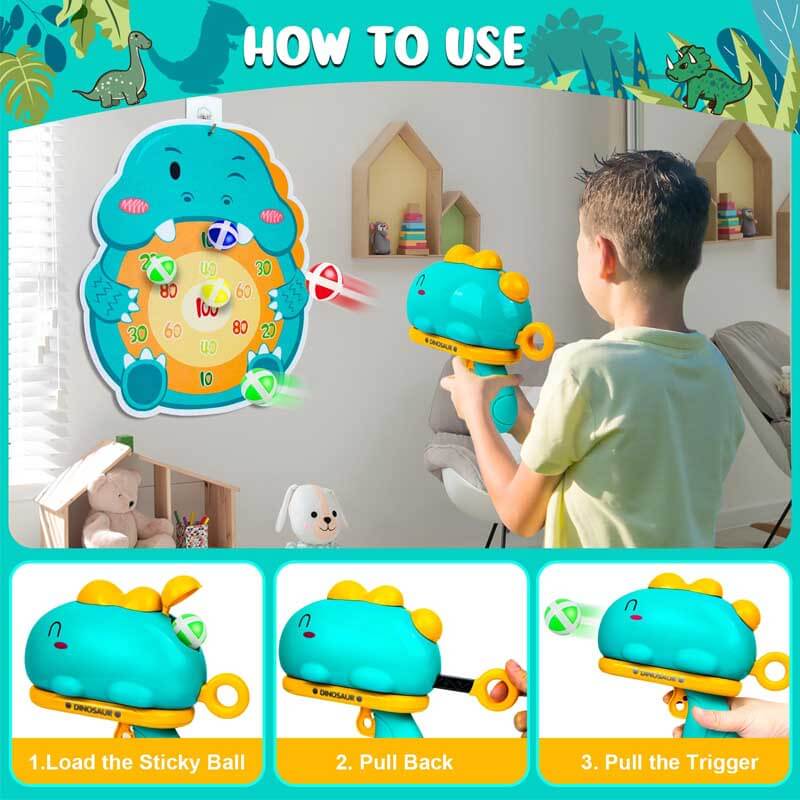 Kids playing dinosaur launcher sticky ball target game on a vibrant green fabric board