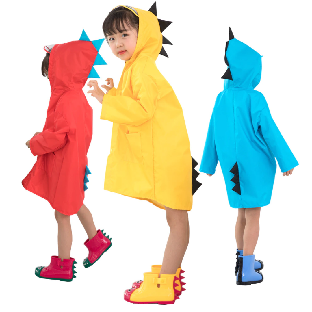 Close-up of a vibrant blue kids' dinosaur hooded raincoat, showing waterproof fabric and playful design