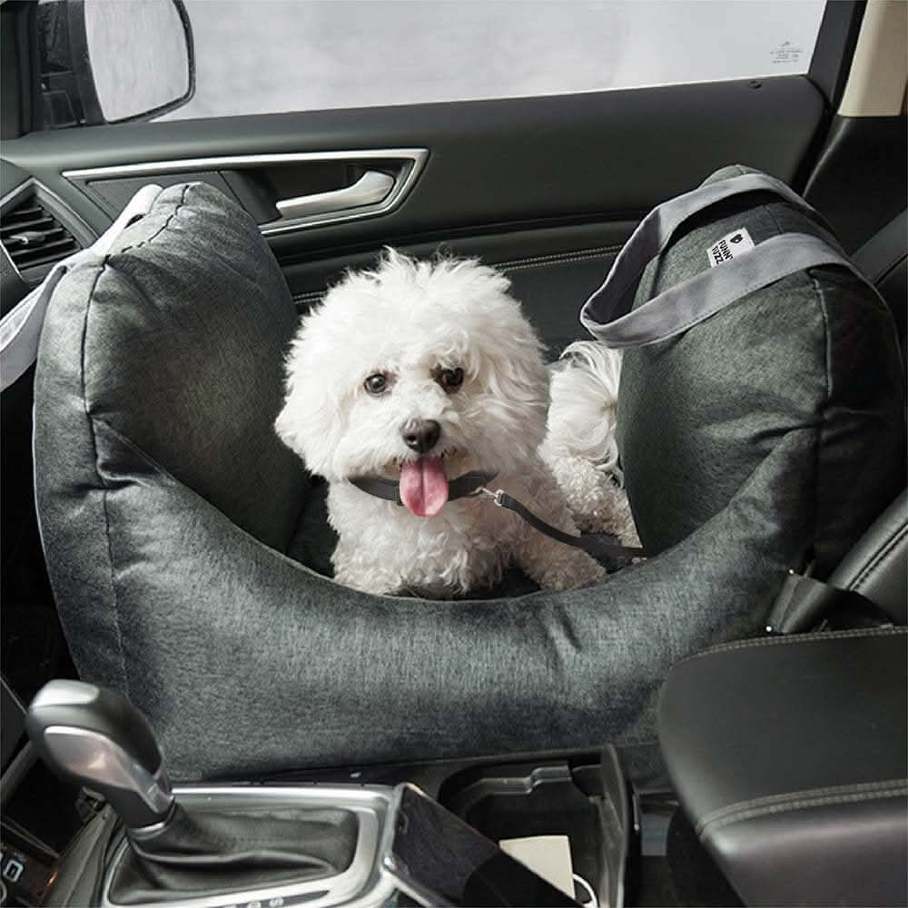 Dog booster car seat with safety belt and non-slip base for safe pet travel.