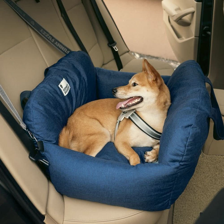 Dog safety car seat with washable cover & non-slip base for worry-free travel.