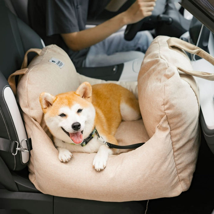 Dog car bed booster seat, providing a stable and elevated perch for your canine friend.