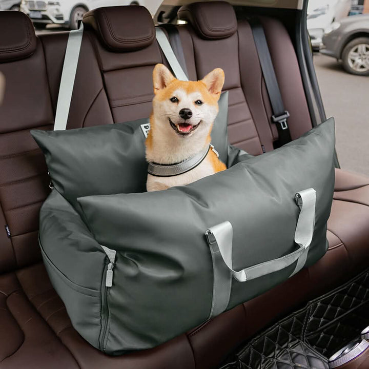 Dog car accessory: plush booster seat with secure straps for a comfortable journey.