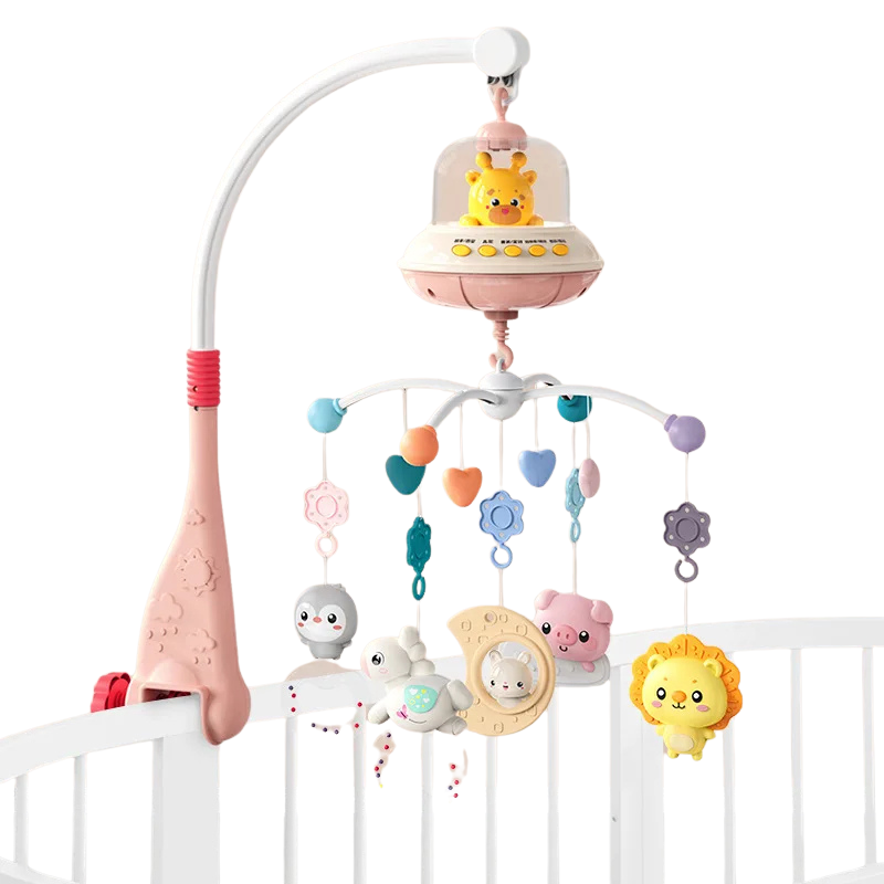 White and grey DreamGlow Musical Crib Mobile attached to crib, functions as nursery decor & sleep aid