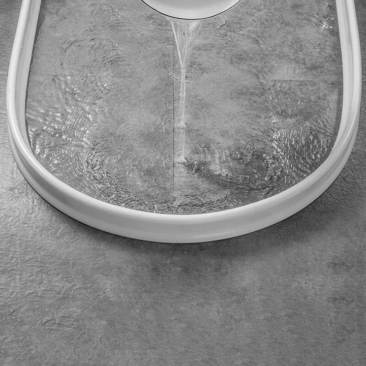 DryGuard flexible silicone water stopper, an essential shower barrier for a safe & dry floor.