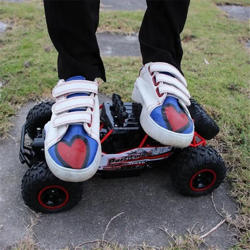 Remote control monster truck jumping obstacles, showcasing extreme all-terrain off-road action.