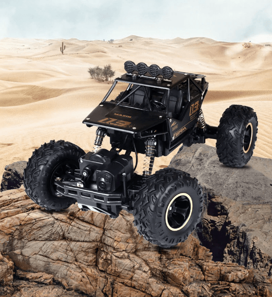Kids' remote control monster truck with ergonomic controller for easy all-terrain driving.