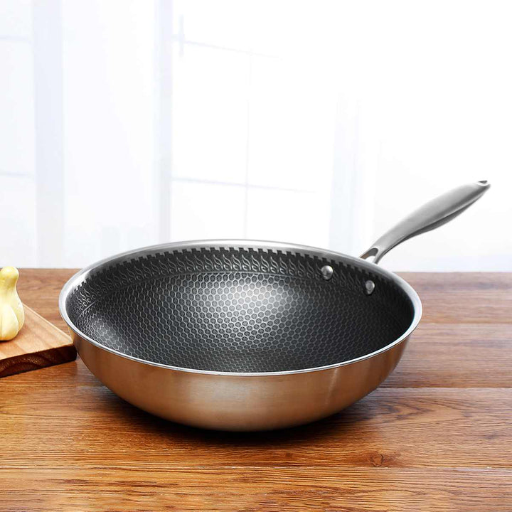 Durable non-stick stainless steel frying pan for healthy home cooking. Easy clean kitchen essential.