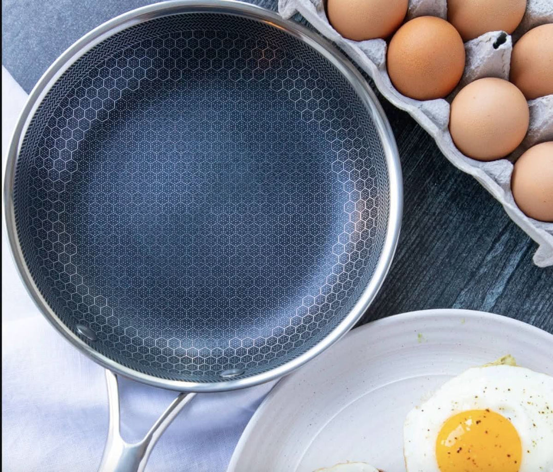 Non-stick stainless steel frying pan for effortless, healthy home cooking. A durable induction-ready pan.