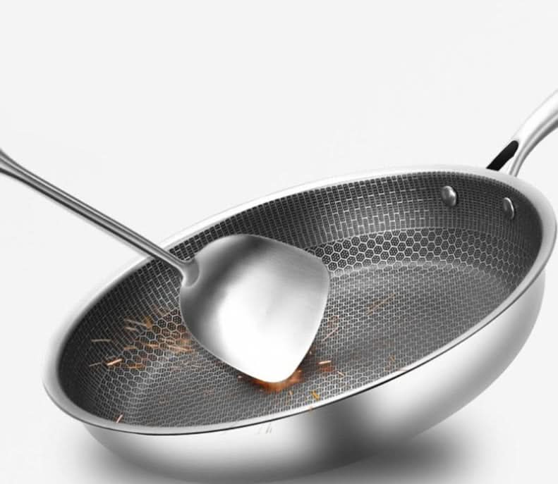 Effortless non-stick stainless steel frying pan ensures easy food release & healthy cooking. Durable cookware.