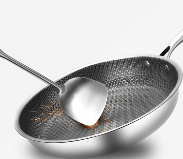Effortless non-stick stainless steel frying pan ensures easy food release & healthy cooking. Durable cookware.