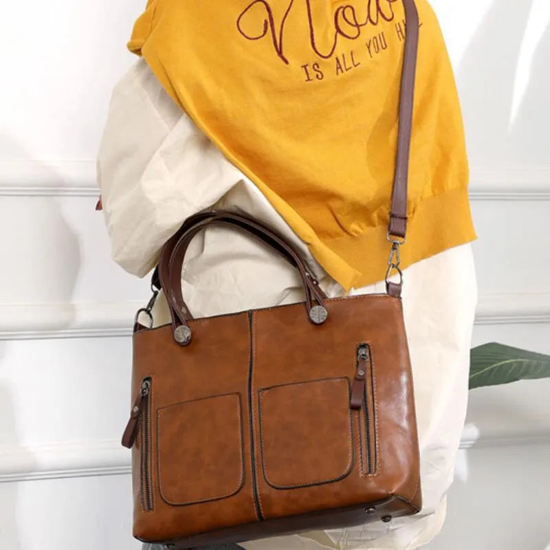 Stylish brown women's tote bag, durable everyday carryall, perfect shoulder & crossbody accessory.